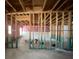 Unfinished basement with framed walls, concrete floor, and exposed beams at 5928 Cobblestone Creek Cir, Mableton, GA 30126