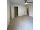 Carpeted bedroom with closet and multiple doors at 5928 Cobblestone Creek Cir, Mableton, GA 30126