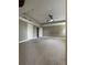 Spacious main bedroom with tray ceiling and views of the backyard at 5928 Cobblestone Creek Cir, Mableton, GA 30126