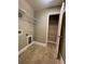 Walk-in pantry featuring tile floors and built-in shelves at 5928 Cobblestone Creek Cir, Mableton, GA 30126