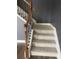 Close up of carpeted staircase with detailed wood and wrought iron at 5928 Cobblestone Creek Cir, Mableton, GA 30126