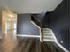 View of the home's staircase with wood and wrought iron features at 5928 Cobblestone Creek Cir, Mableton, GA 30126