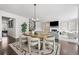 Dining area with view of fireplace and stairway at 236 Himalaya Way Way, Mcdonough, GA 30253