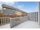 Backyard deck view overlooking other homes and a fence for privacy at 239 Valley Xing, Canton, GA 30114