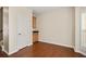 Bright dining area features hardwood floors and adjacent storage cabinet at 239 Valley Xing, Canton, GA 30114