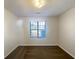 Cozy bedroom with a neutral color palette and large window at 2721 Arctic Ct, Morrow, GA 30260