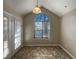 Bright dining area features large window and door to backyard at 2721 Arctic Ct, Morrow, GA 30260