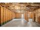 Unfinished basement with a concrete floor, wooden framing, and visible insulation, awaiting personalization at 847 Sand Ln, Lawrenceville, GA 30045