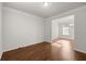 Bright living room with hardwood floors, white trim and abundant natural light at 847 Sand Ln, Lawrenceville, GA 30045