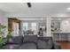 View of the open concept kitchen, dining and living room with lots of natural light at 1077 Roanoke Ave, Mcdonough, GA 30253