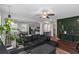 Spacious living room is open to the kitchen and dining area with abundant natural light at 1077 Roanoke Ave, Mcdonough, GA 30253