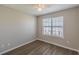 Bedroom featuring ample natural light from a window with a ceiling fan at 2454 Brianna Dr, Hampton, GA 30228