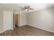 Bedroom featuring hardwood floors and an entrance to the hallway at 2454 Brianna Dr, Hampton, GA 30228