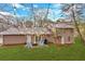 Spacious backyard with a fire pit, patio, and string lights at 3060 Eastland Way, Snellville, GA 30078