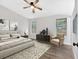 Modern main bedroom with neutral walls, modern furniture, and luxury plank flooring at 3060 Eastland Way, Snellville, GA 30078