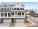 Attractive townhome with brick facade, garage, and welcoming front porch at 403 Inglenook Walk, Marietta, GA 30060