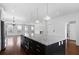 Open kitchen with large island and stainless steel appliances at 403 Inglenook Walk, Marietta, GA 30060