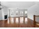 Living room with fireplace and hardwood floors at 403 Inglenook Walk, Marietta, GA 30060