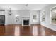 Spacious living room with fireplace and large windows at 403 Inglenook Walk, Marietta, GA 30060