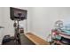 Bright exercise room featuring a Peloton bike and wooden floors, perfect for at-home workouts at 6838 Prelude Dr, Atlanta, GA 30328