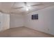 Basement bedroom featuring neutral carpet, white walls and window at 825 Sugar Creek Se Way, Conyers, GA 30094