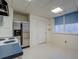 Basement kitchen featuring stainless steel refrigerator at 825 Sugar Creek Se Way, Conyers, GA 30094