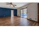 Bedroom with blue accent wall and sliding glass doors leading to a swimming pool area at 825 Sugar Creek Se Way, Conyers, GA 30094