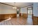 Cozy dining room with wood trim and hardwood floors at 825 Sugar Creek Se Way, Conyers, GA 30094