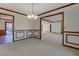 Dining room features wood trim and chandelier at 825 Sugar Creek Se Way, Conyers, GA 30094