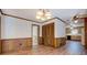 Dining room with hardwood floors and wooden cabinets at 825 Sugar Creek Se Way, Conyers, GA 30094