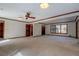 Large living room featuring neutral carpet, and wood trim at 825 Sugar Creek Se Way, Conyers, GA 30094