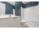 Bathroom with vanity and shower tub at 1390 Bridle Path Dr, Lawrenceville, GA 30045