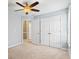Bedroom featuring natural light and large closet at 1390 Bridle Path Dr, Lawrenceville, GA 30045