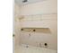 Laundry room with ample shelving for storage at 1390 Bridle Path Dr, Lawrenceville, GA 30045