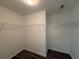 Walk-in closet featuring built in shelving at 2728 Sandalwood Cir, Locust Grove, GA 30248