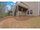 Exterior view of deck with access to the backyard and ground level access at 5720 Stow Dr, Tucker, GA 30084