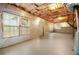 Spacious unfinished basement with exposed insulation and multiple windows at 5720 Stow Dr, Tucker, GA 30084