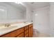 Bright bathroom with a double sink vanity and a large mirror at 5720 Stow Dr, Tucker, GA 30084