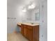 Spacious bathroom featuring vanity with drawers, neutral countertop, and large mirror at 5720 Stow Dr, Tucker, GA 30084