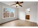 Bright bedroom with a ceiling fan and an en-suite bathroom at 5720 Stow Dr, Tucker, GA 30084