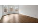 Bright bedroom with natural light and hardwood floors is perfect for relaxation and rest at 5720 Stow Dr, Tucker, GA 30084