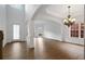 Spacious living room with hardwood floors, high ceilings, and abundant natural light at 5720 Stow Dr, Tucker, GA 30084