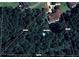 Aerial view of property boundaries showcasing a large wooded lot at 679 Victorian Cir, Dallas, GA 30157