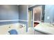 Bathroom featuring a soaking tub and updated vanity at 679 Victorian Cir, Dallas, GA 30157