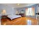 Spacious bedroom with hardwood floors and ample natural light at 679 Victorian Cir, Dallas, GA 30157
