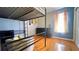 Bedroom with hardwood floors, bunk bed, and dresser at 679 Victorian Cir, Dallas, GA 30157