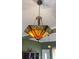Stunning chandelier adds elegance to this room's interior design at 679 Victorian Cir, Dallas, GA 30157