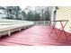 Spacious outdoor deck with built-in seating, perfect for entertaining guests at 679 Victorian Cir, Dallas, GA 30157