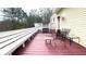 Outdoor deck featuring seating, perfect for relaxing and enjoying the surroundings at 679 Victorian Cir, Dallas, GA 30157
