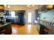 Kitchen with black cabinets, countertops and stainless appliances at 679 Victorian Cir, Dallas, GA 30157